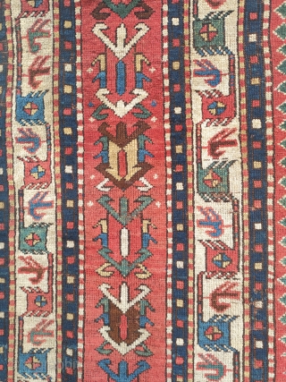 early tribal kazak with white ground bird-borders and great colours. 2 main areas of wear, on the right side and at the top of the narrow green field. no restorations apart of  ...