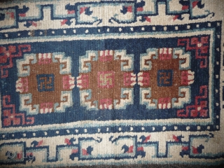 19th century small sized tibetan rug with white border, nice  natural dyes and quite good pile. tibet, approx 110x 65cm.            