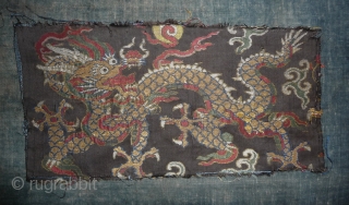 nice small silk brocade fragment from probably a formal court coat. the gold-wrapped threads are mostly in good condition. china around 1700. 34x 17cm         