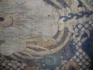 rarely has a brocade the look of a kesi (tapestry weave). beautifull  fragment of a 17th century silk brocade. wonderfull drawing and palette. tibetan patchwork but originally possibly part of a  ...