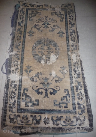 an  exceptional early east tarim basin rug.
this kind of central medallion  composed of  4 animals is well documented 
by early artefacts (mostly silver and silk) of the liao culture.  ...