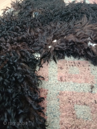 fantastic longhair sheep skin from northwest china alashan desert area. beautifull braun black fine wool. it dates from not later than beginning 20th century, as the material and making  is similar  ...