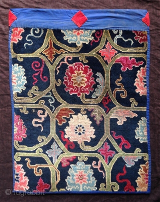 very nice early 20th century tibetan cushion cover. had been  once mounted  with cloth frame to be used as a saddle top.         