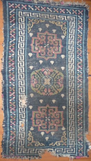 interesting old design on this early 19th c tibetan khaden, nice weave and colors.some condition problems, but easy restorable if needed.
tibet, early 19 century. 120x 68cm       