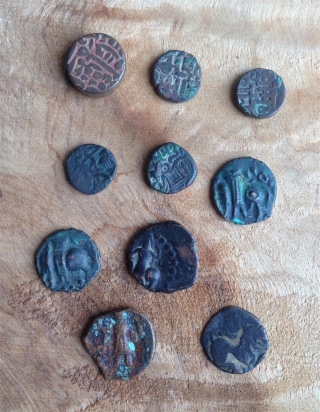 10 coins from the ancient silk road dating approximately from 3th to 6th century depicting talisman, animals, warriors, script, pearl roundel like design etc...  exchange possible, low rate..    