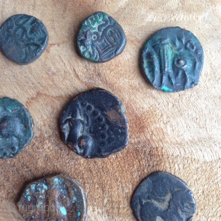 10 coins from the ancient silk road dating approximately from 3th to 6th century depicting talisman, animals, warriors, script, pearl roundel like design etc...  exchange possible, low rate..    