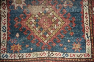 little caucasian rug -110x 95cm- with some wear and missing, but it left quite a lot to decipher. very esthetically made blue field with a well placed abrash in the upper part  ...