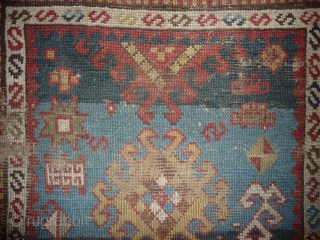 little caucasian rug -110x 95cm- with some wear and missing, but it left quite a lot to decipher. very esthetically made blue field with a well placed abrash in the upper part  ...