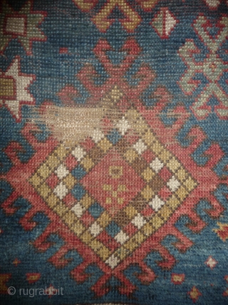 little caucasian rug -110x 95cm- with some wear and missing, but it left quite a lot to decipher. very esthetically made blue field with a well placed abrash in the upper part  ...