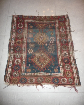 little caucasian rug -110x 95cm- with some wear and missing, but it left quite a lot to decipher. very esthetically made blue field with a well placed abrash in the upper part  ...