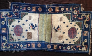 late 19th century tibetan white ground saddle rug with very nice all natural colors,. very good condition,super fine wool and very tight knotting. abrashed light green center and deeper green corners..  