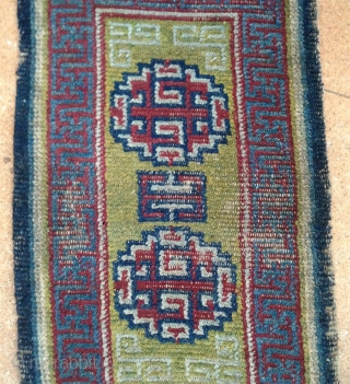 early tibetan saddle rug with beautiful clear old colors. exquisite light green back ground. very fine weave and super soft handle.. mid 19th century         