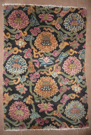 wonderfull tibetan seat with lotos blossom design. excellent weave and condition. tibet around 1900. 51x 76cm                 