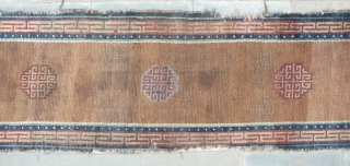 beautiful early tibetan monastic bench cover fragment with floating guls on an empty brown space. lovely patinated old colors, the black color in places is a natural brown overdyed with dark indigo.super  ...