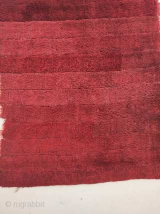 -master red-
19th c. warp-faced back long pile weaving on a tsukdruk loom. originaly a tibetan monk cloak.
made of 16 narrow strips, fantastic red most probably from madder roots. best of type, very  ...
