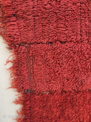 -master red-
19th c. warp-faced back long pile weaving on a tsukdruk loom. originaly a tibetan monk cloak.
made of 16 narrow strips, fantastic red most probably from madder roots. best of type, very  ...