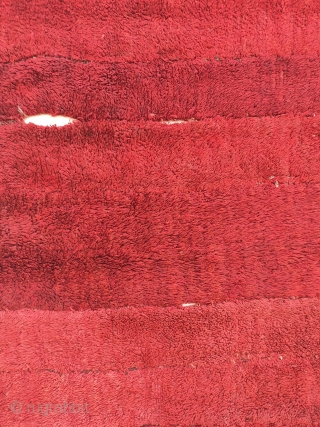 -master red-
19th c. warp-faced back long pile weaving on a tsukdruk loom. originaly a tibetan monk cloak.
made of 16 narrow strips, fantastic red most probably from madder roots. best of type, very  ...