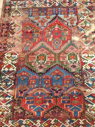 a fantastic north west persian kurdish rug with an incredible richness of colours, an amazing wool. best of type and possibly of the oldest with this design.      