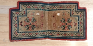 tibetan saddle rug with very unusual center panel design made of 4 lotus jewels, very good all natural colors uncludind 2 purples, 2 greens, 2 blues, a brillant red and a pink  ...