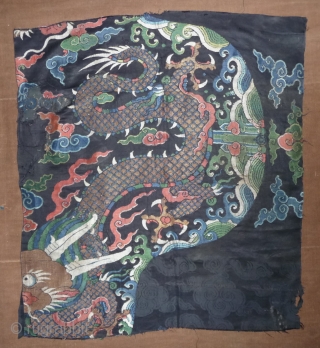 fragment of a 17th century dragon robe. silk brocade with gold threads. china, 62x 68cm                  