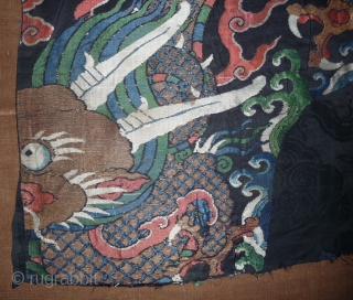 fragment of a 17th century dragon robe. silk brocade with gold threads. china, 62x 68cm                  