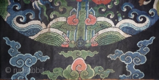 fragment of a 17th century dragon robe. silk brocade with gold threads. china, 62x 68cm                  