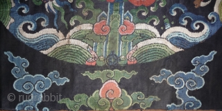 fragment of a 17th century dragon robe. silk brocade with gold threads. china, 62x 68cm                  