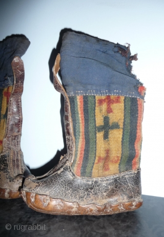 rare pair of tibetan child boots. leather and pulo wool.tibet, early 20th c. or before.                  