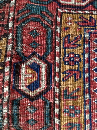 an antique small (115x 84cm) caucasian rug possibly avar with wonderful intense well patinated natural colours. very nicely woven the pile feels like velvet..uncommon main border.. there is no repair except for  ...