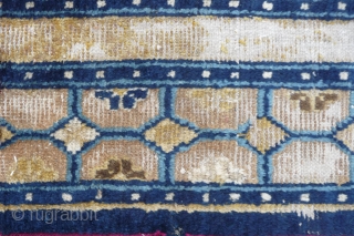 fragment of an early rare ningxia carpet. this design mostly found on eastturkestan carpets is extremly rare on ningxia (of this age!), possibly unique? the remnant corner of which must has been  ...