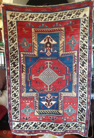 19th century small caucasian rug with bold  color contrast and unusual design details..                   