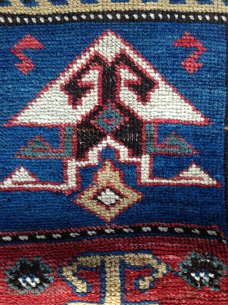 19th century small caucasian rug with bold  color contrast and unusual design details..                   