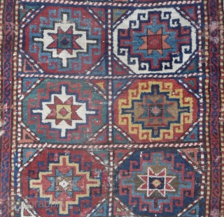 mid 19th c shasavan long rug with rare border and well deep saturated colors, beautiful greens, strong yellow and orange... some camel pile, missing a bit all around and scattered old repiling.  ...