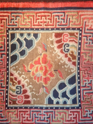 wonderful tibetan mat from first third of the 20th century. in superb complete condition with a nicely patinated surface. some rest of the felt frame at the ends which will be easily  ...