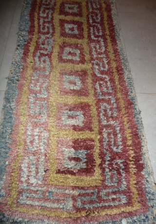 this is a very beautiful early tibetan monastic bench cover warp-faced-back rug with uncommon single row of large squares. it is in very good condition with super natural colors; strong attrativ red,  ...