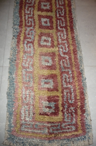 this is a very beautiful early tibetan monastic bench cover warp-faced-back rug with uncommon single row of large squares. it is in very good condition with super natural colors; strong attrativ red,  ...