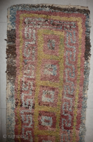 this is a very beautiful early tibetan monastic bench cover warp-faced-back rug with uncommon single row of large squares. it is in very good condition with super natural colors; strong attrativ red,  ...