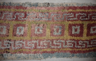 this is a very beautiful early tibetan monastic bench cover warp-faced-back rug with uncommon single row of large squares. it is in very good condition with super natural colors; strong attrativ red,  ...