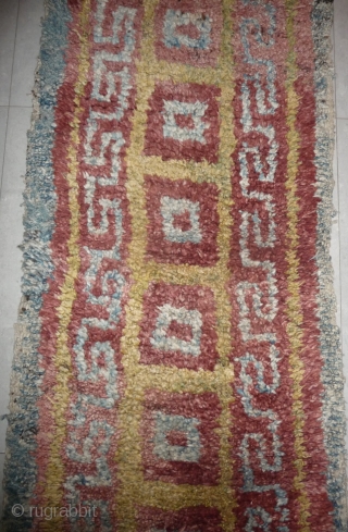 this is a very beautiful early tibetan monastic bench cover warp-faced-back rug with uncommon single row of large squares. it is in very good condition with super natural colors; strong attrativ red,  ...