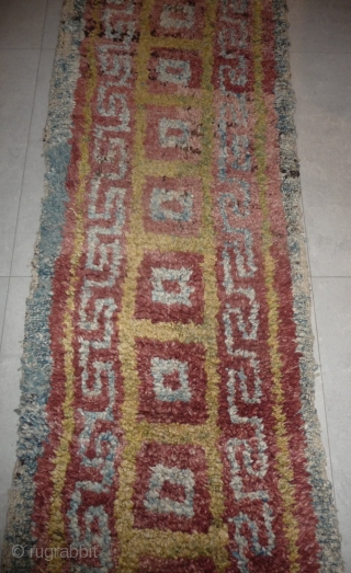 this is a very beautiful early tibetan monastic bench cover warp-faced-back rug with uncommon single row of large squares. it is in very good condition with super natural colors; strong attrativ red,  ...