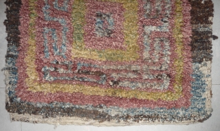 this is a very beautiful early tibetan monastic bench cover warp-faced-back rug with uncommon single row of large squares. it is in very good condition with super natural colors; strong attrativ red,  ...