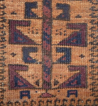 beautiful baluch prayer rug with prayer wear.attrativ hand panel and turkmen field design with a strong reciprocity effect.lots of interesting small amulets. all natural colors with very nice apricot ground color.silk highlights  ...