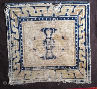 an early 18th century , about 300 years old chinese ningxia square with bold white corner. perfectly executed design using reciprocity effect, note also the symetry in the border showing the 4  ...