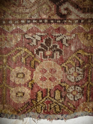 an early khotan fragment  in the khaden size (160cm), an interesting colors palette with an uncommon extensiv use of different golden yellow hue. fantastic wool and handle, cotton weft  mixed  ...