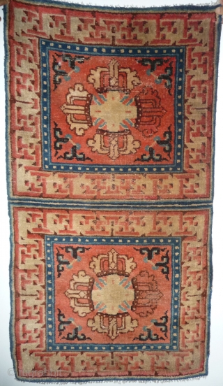 only late 19th c dorje temple sitting runner fragment, only 6 rows at botton end rewoven.
please note the color change of the east branch of the dorje. only for those who are  ...