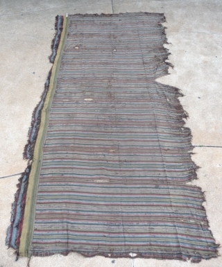 by many points is this old tibetan stripe-weaving textile a rarity:
it is around 400x180cm (it was possibly a tent divider)
it has fantastic well patinated natural colors, including light purple, pink, carmine rot,  ...