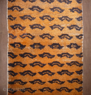 not a tibetan weaving but this small tiger rug was intented for a tibetan monastery to be hung in a door way or as pillar decoration. despite of its late 19thc or  ...