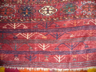 Early tekke main carpet  fragment (cut and shut at top, missing 1 row of guls)with a rare elem, fantastic fine wool and colors including ruby red highlights and very fine weave.  ...