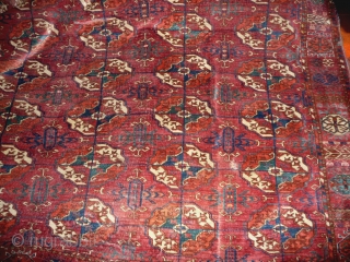 Early tekke main carpet  fragment (cut and shut at top, missing 1 row of guls)with a rare elem, fantastic fine wool and colors including ruby red highlights and very fine weave.  ...