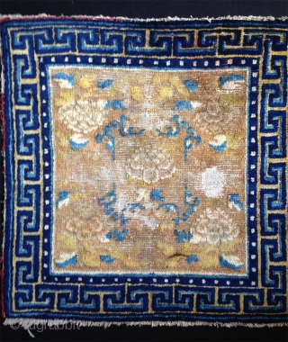 late 18th century ningxia square with 5 peonies. some spots of wear but still very attractiv and with beautiful wool and colors.           